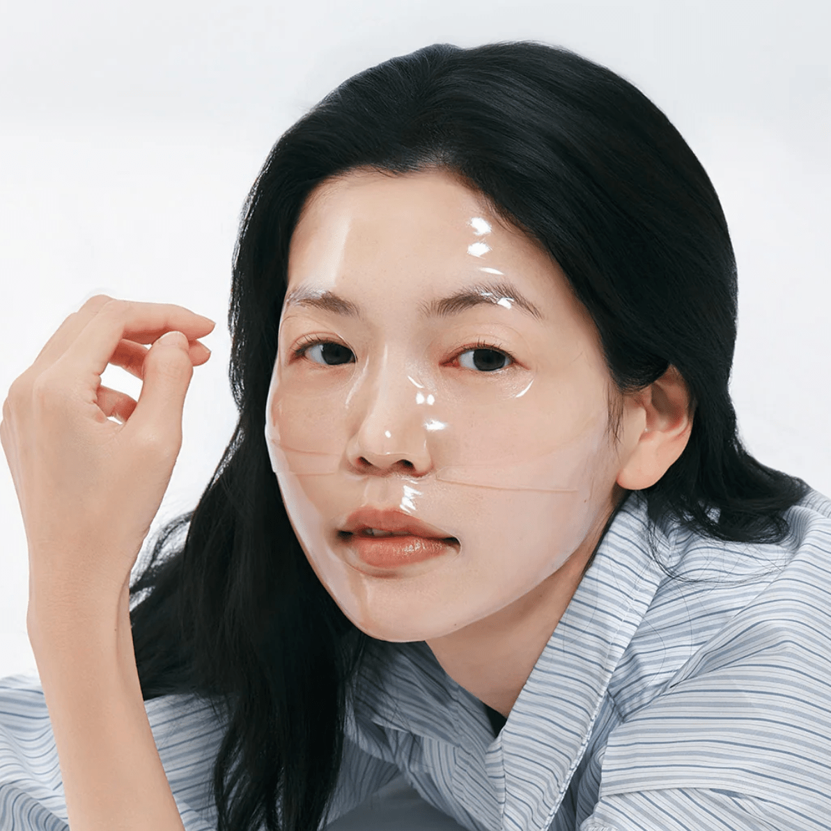 Women with sheet mask on face