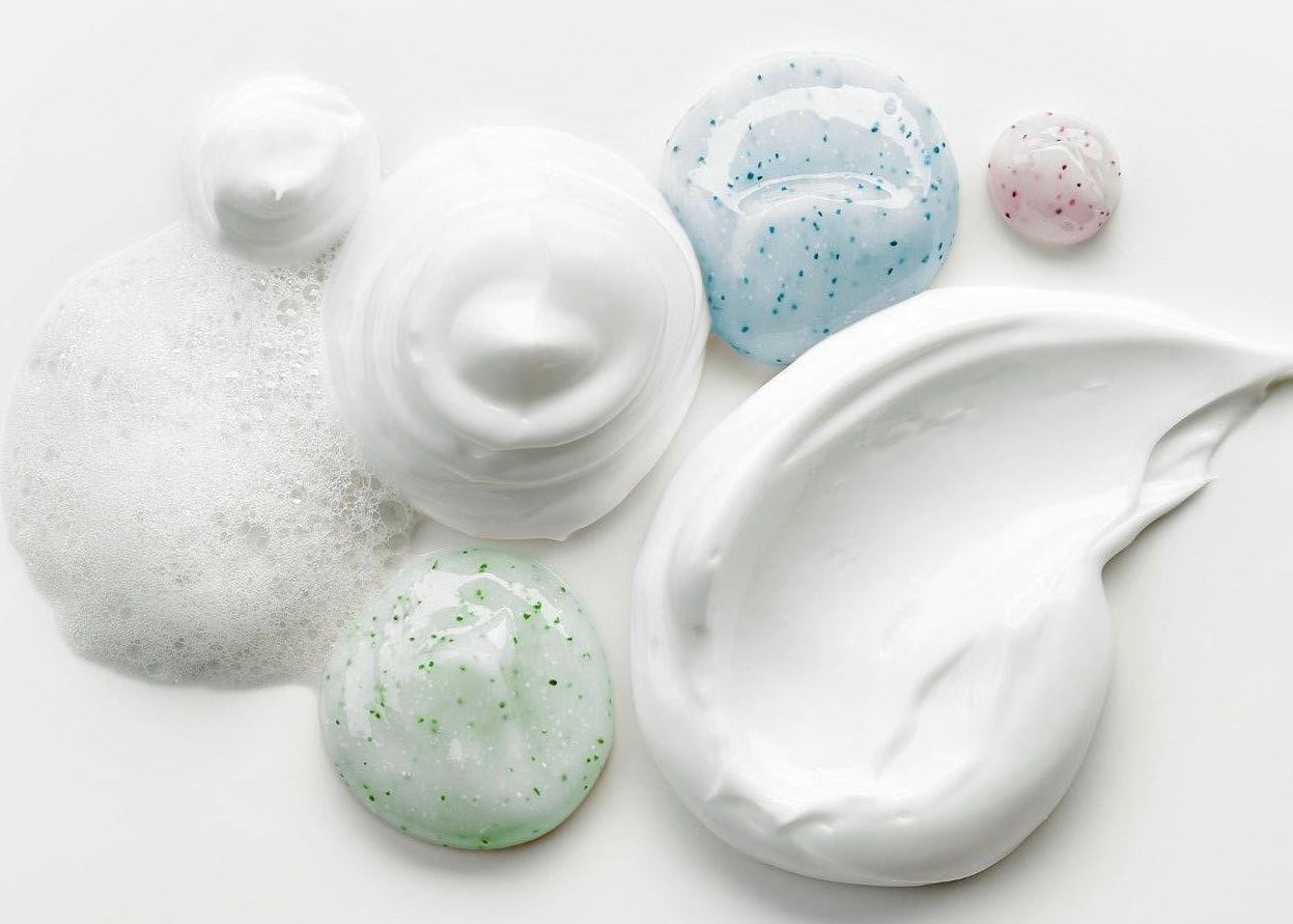 mixed skincare texture on white background