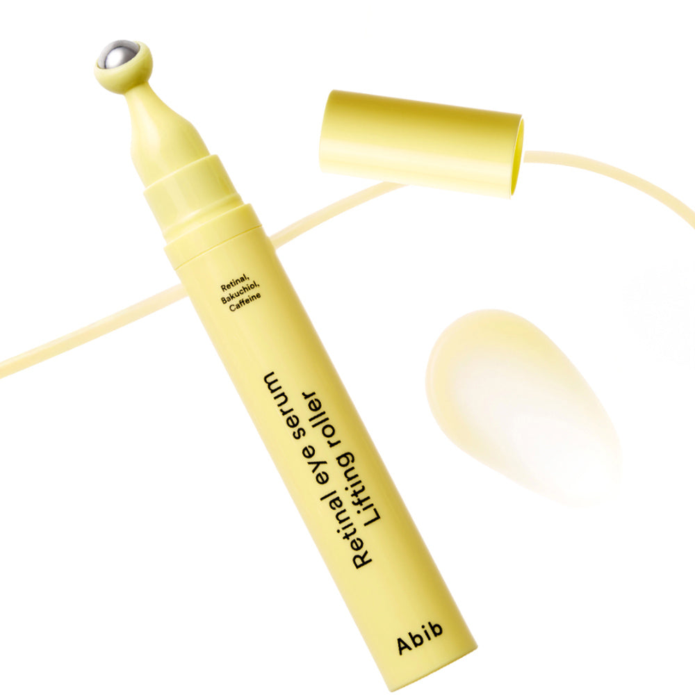 Yellow eye serum roller with 'Abib' branding on a white background