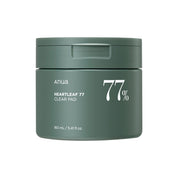 Green jar of Anua Heartleaf 77 Clear Pad on a white background