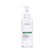Clear bottle with pump labeled ANUA Heartleaf Pore Control Cleansing Oil Mild on a white background