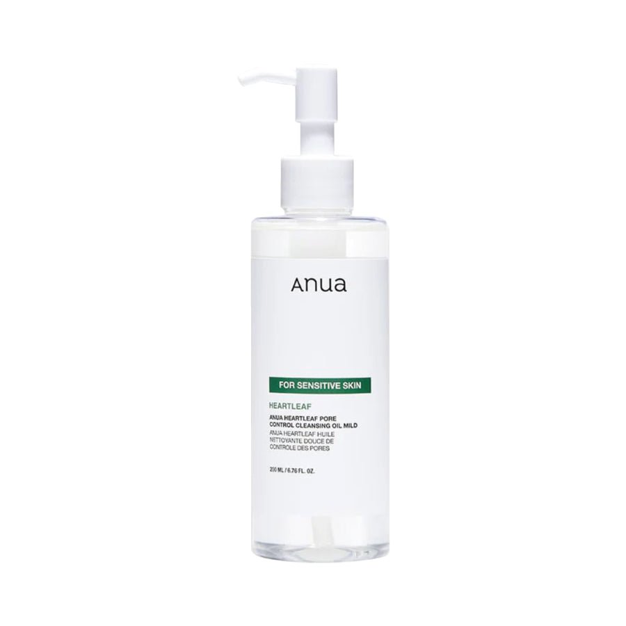 Clear bottle with pump labeled ANUA Heartleaf Pore Control Cleansing Oil Mild on a white background