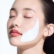 Women has ANUA PDRN Collagen Melting Patch For Glass Skin on the face