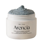 Jar of Arencia Royal Blue Hyssop Cleanser with grayish-blue cream on a white background