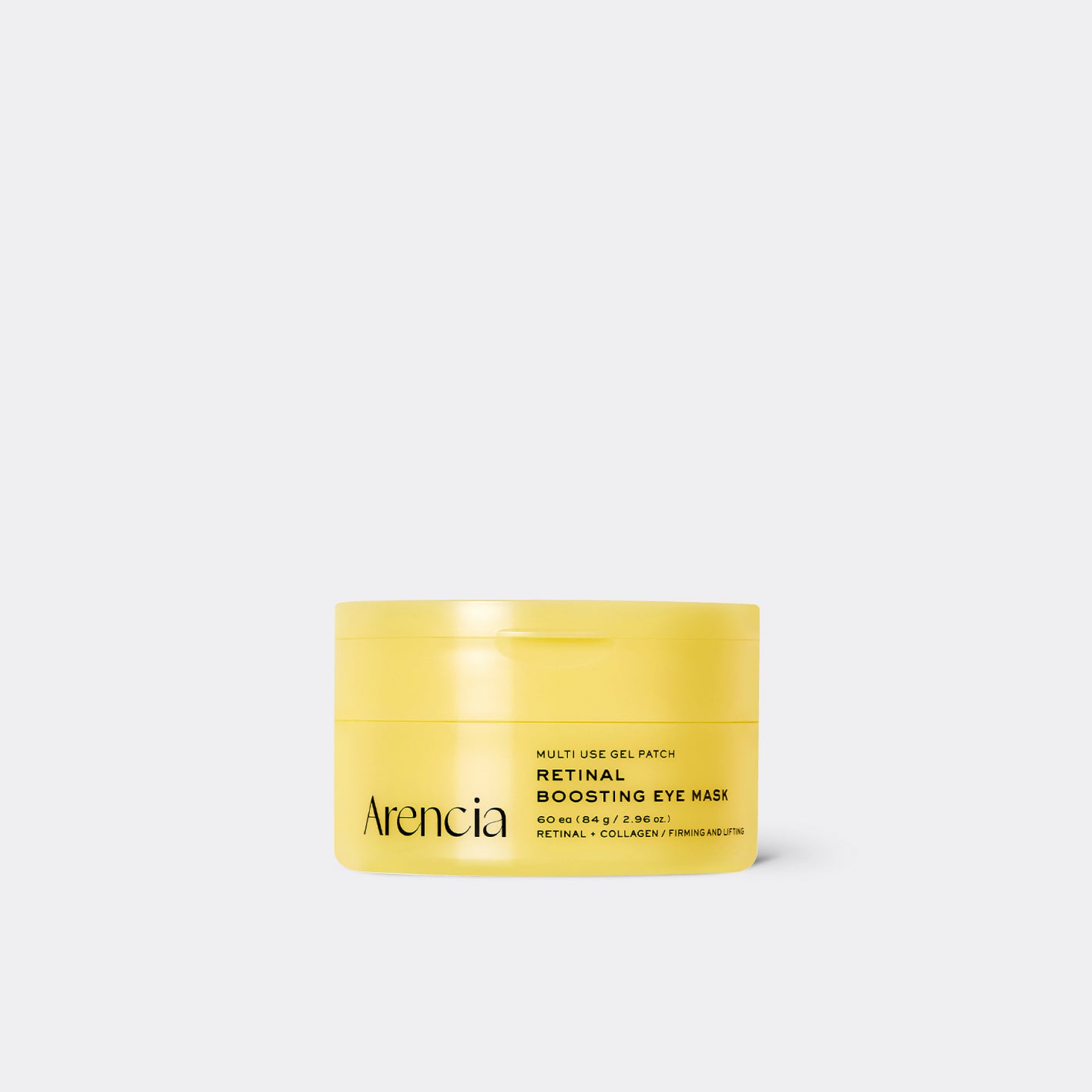A yellow jar of Arencia Retinal Boosting Eye Mask on a light gray background.