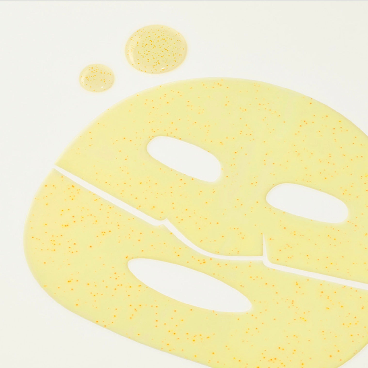 ARENCIA Vita Collagen Radiance Jello Mask with orange speckles, shown on a clean white background with two small droplets of the same product above it.