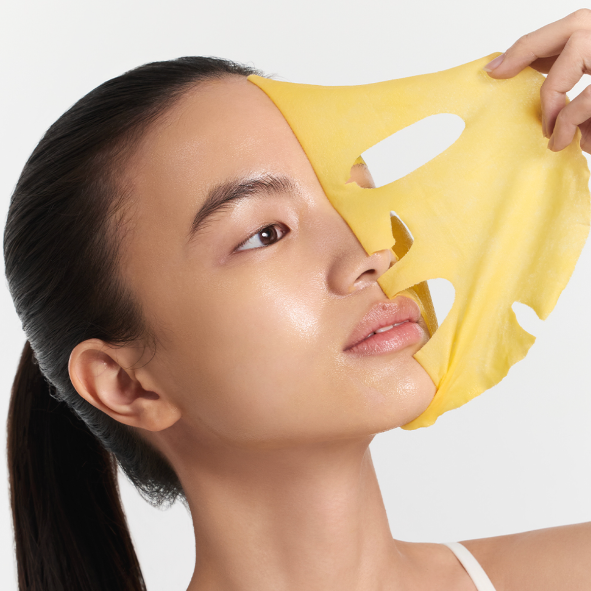 ARENCIA Vitamin C Booster Shot Mask on the face