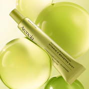 ARENCIA Vitamin C Booster Shot 30ml tube between green yellow balls