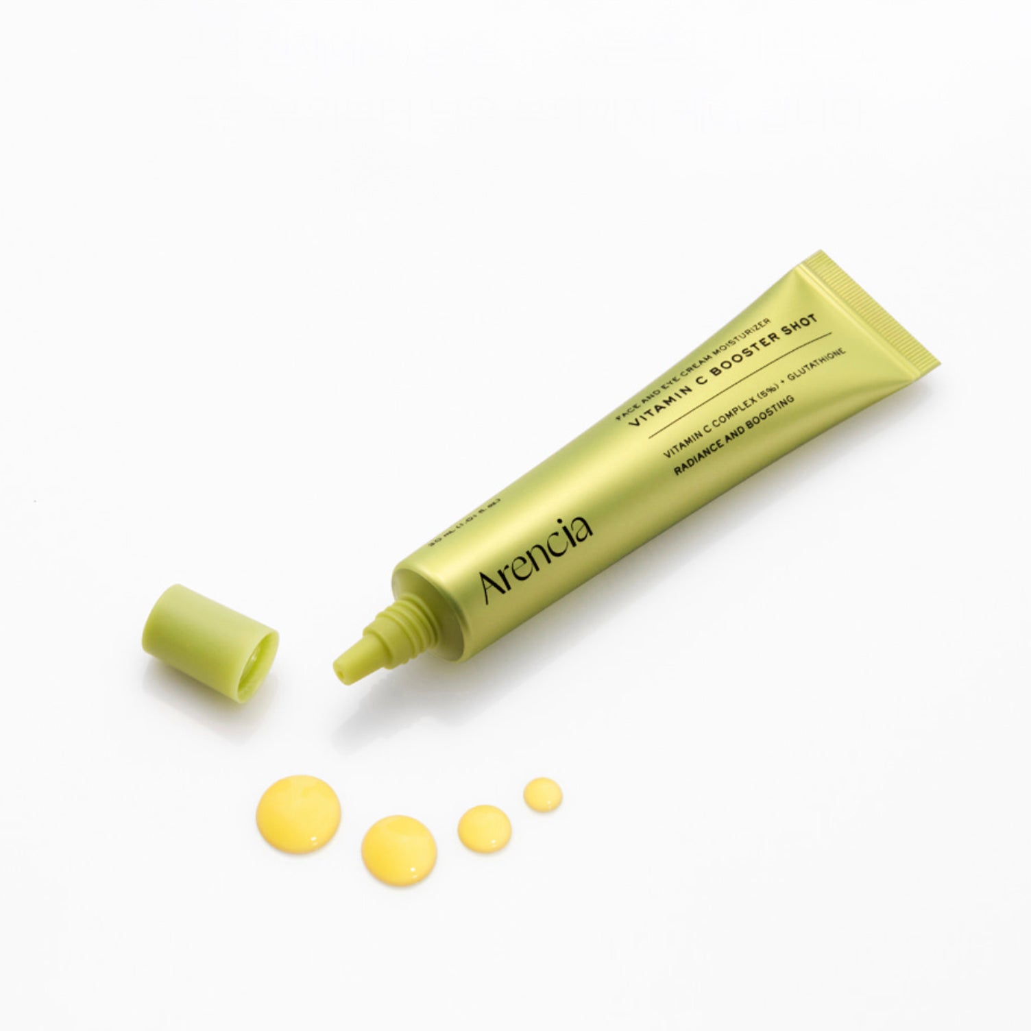 ARENCIA Vitamin C Booster Shot 30ml on white background with drop of yellow serum