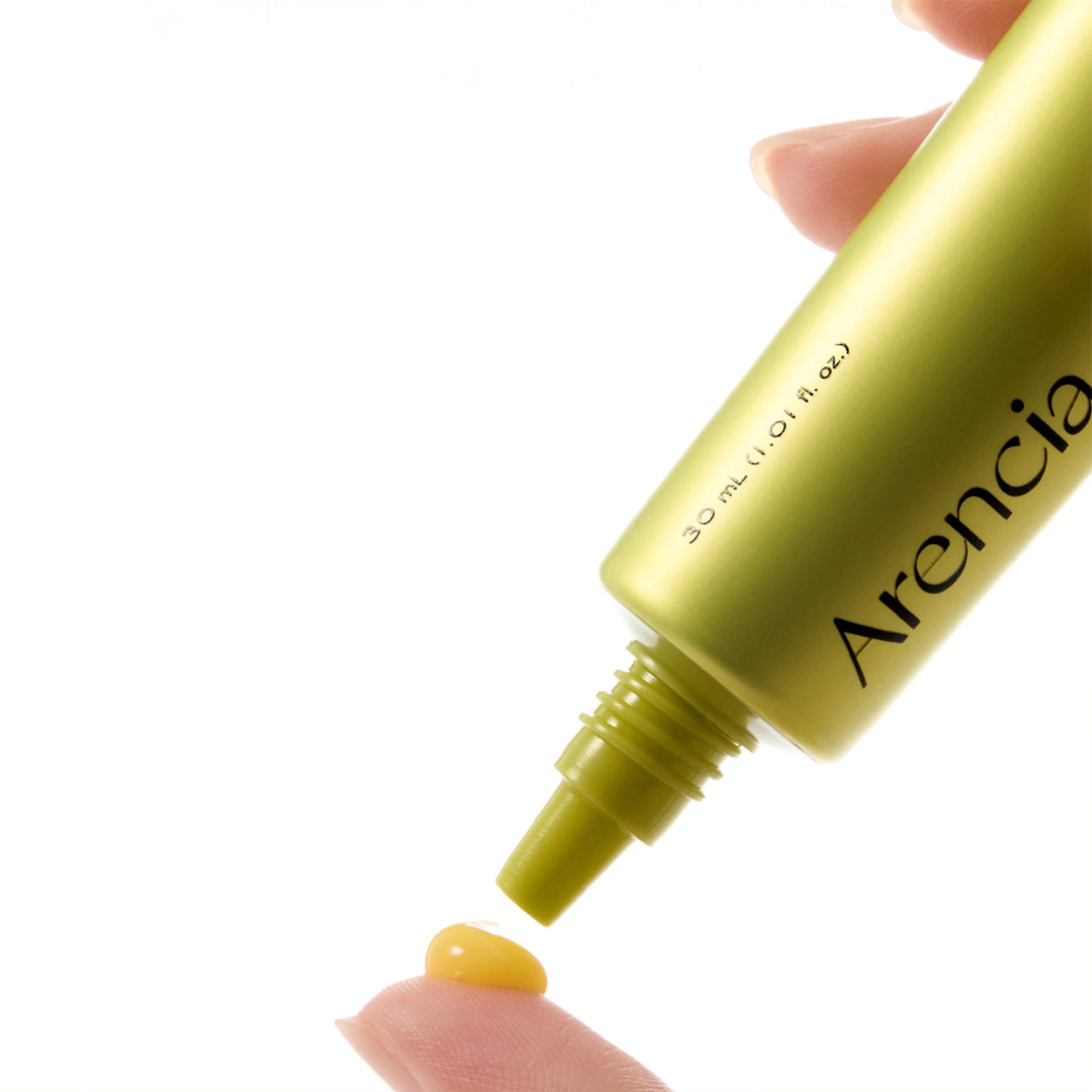 ARENCIA Vitamin C Booster Shot 30ml drop on finger with white background