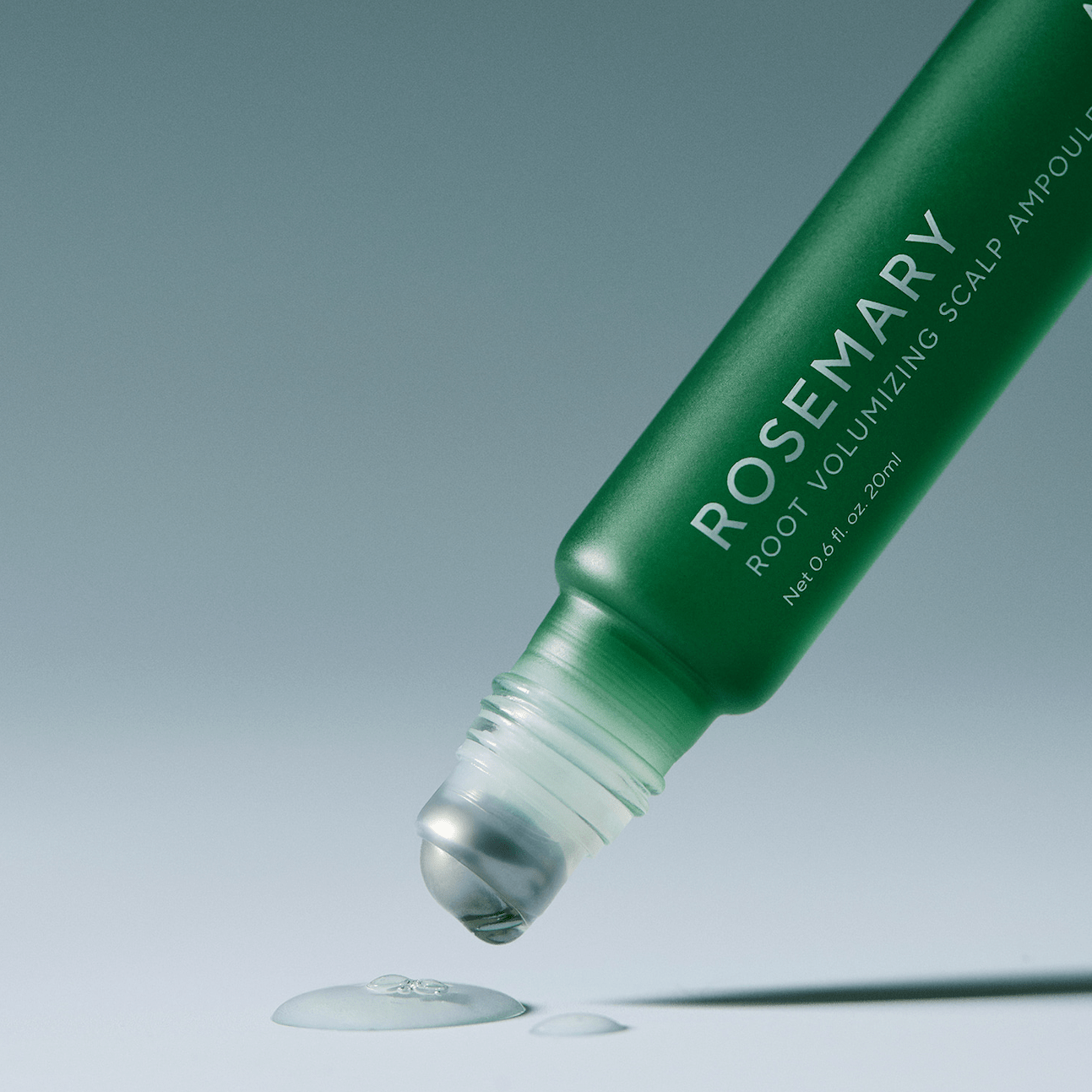 AROMATICA Rosemary Root Volumizing Scalp Ampoule on a gray background