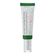 Tube of Axis-Y Dark Spot Correcting Glow Serum on a white background