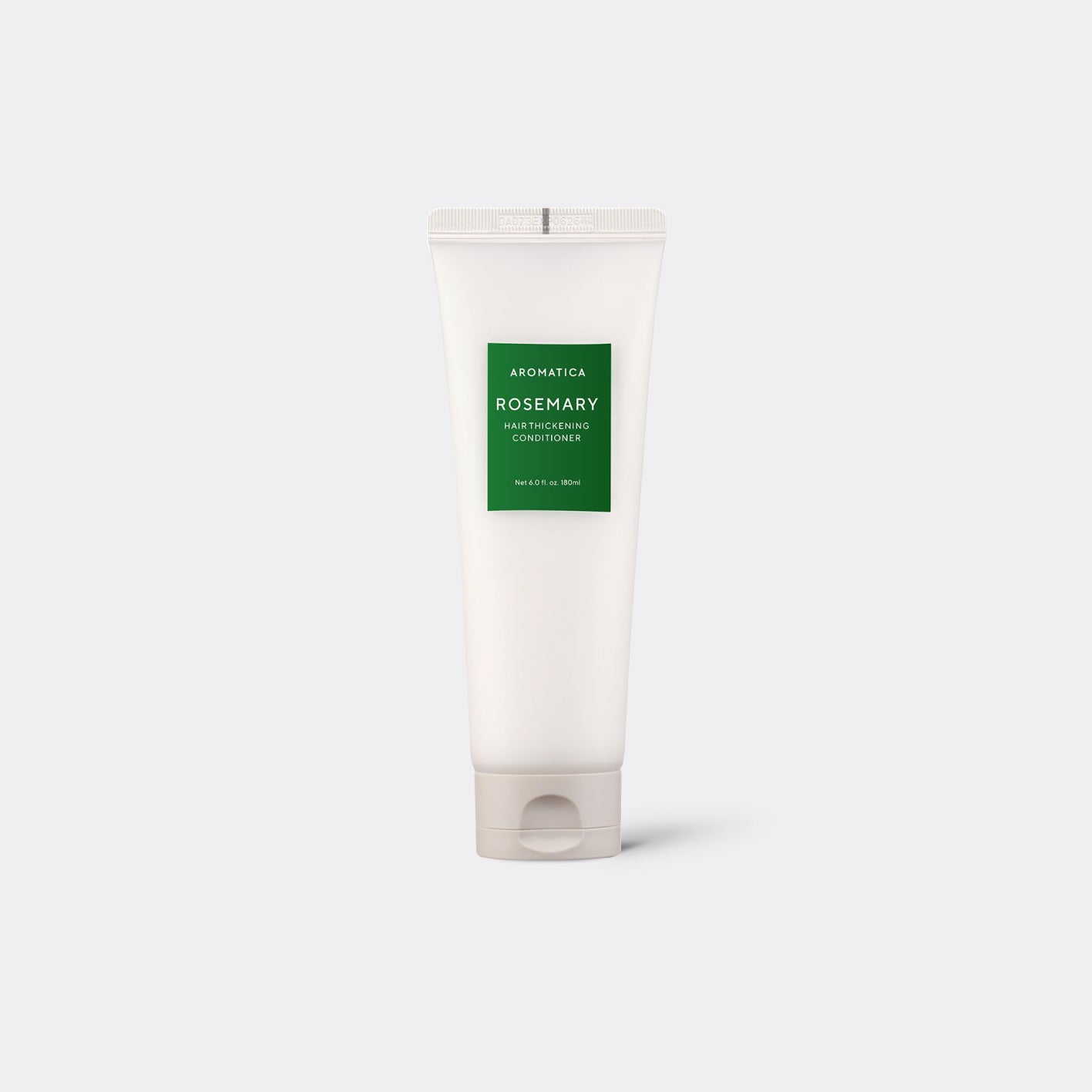 White tube of AROMATICA Rosemary Hair Thickening Conditioner product on a white background