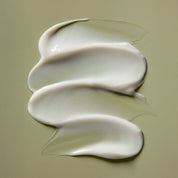 AROMATICA Rosemary Hair Thickening Conditioner white cream texture on a beige background