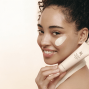 Woman applying BEAUTY OF JOSEON Ginseng Retinol Firming Cream with a focus on her face