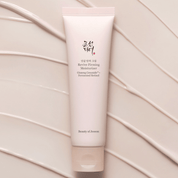 Tube of Beauty of Joseon Revive Firming Moisturizer on a beige background