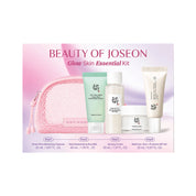 Beauty of Joseon Glow Skin Essential Kit featuring a pink mesh makeup bag and five skincare products (cleanser, toner, and moisturizer, sunscreen) arranged on a pink and purple gradient background with step-by-step labels.