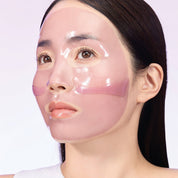 Woman wearing Biodance Rejuvenating Caviar PDRN Real Deep Mask on a white background