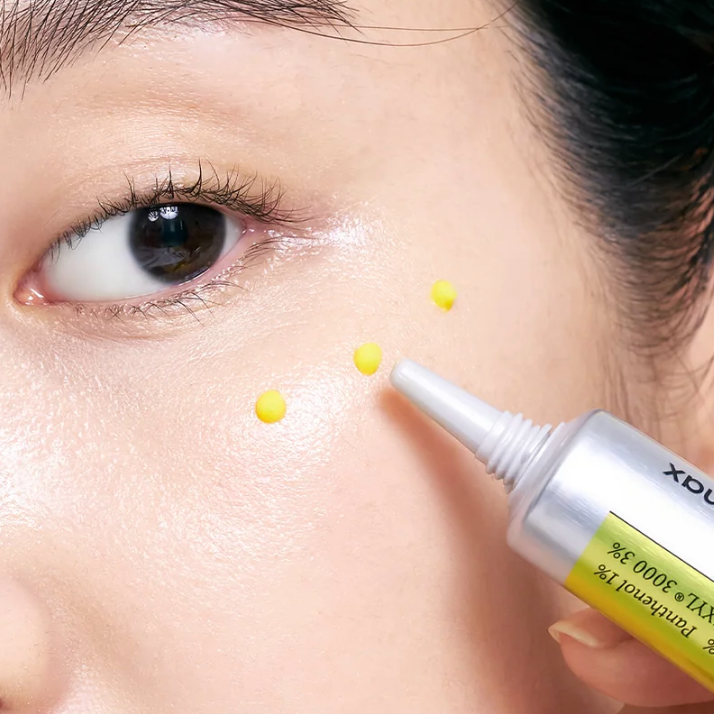 Women applying Celimax The Vita A Retinal Shot Tightening Booster under eye area