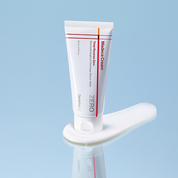 Centellian24 Madeca Cream Time Reverse Zero on cream texture with blue background