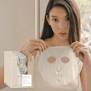 Woman holding a facial mask sheet with   Dr. Althea 345 Cream Mask packaging in the background