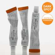 Three tubes of Dr. Althea Melaclear Dark Spot cream are displayed against a clean white background, with two tubes standing upright and one tube lying on its side.