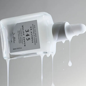 Dr. Althea relief serum bottle with dropper on a gray background