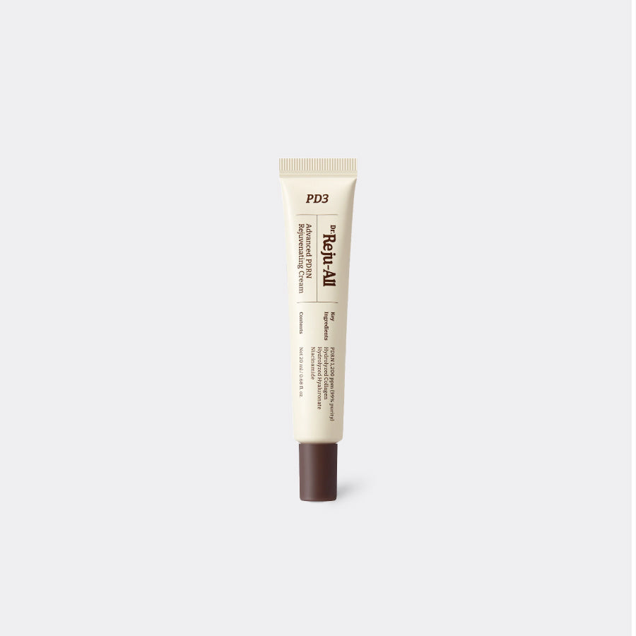 A single tube of Dr. Reju-All Advanced PDRN Rejuvenating Cream centered on a light gray background.
