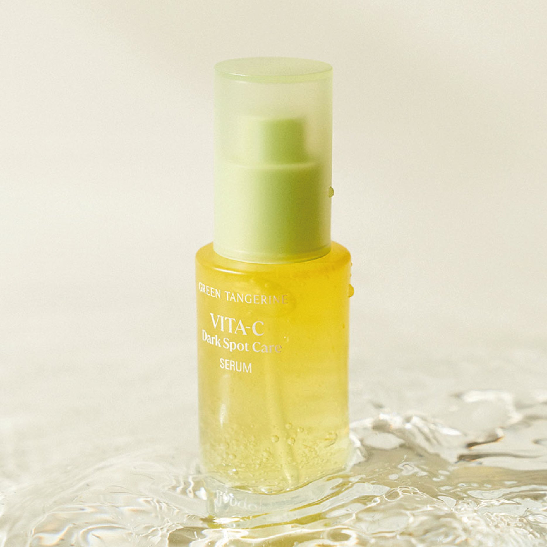 GOODAL Green Tangerine Vita C Dark Spot Care Serum on water texture
