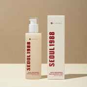 K-SECRET SEOUL 1988 Essence Snail Mucin 97% + Rice with packaging on a beige background