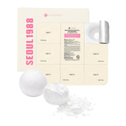 K-SECRET Seoul 1988 Boosting Ball Collagen 100% featuring a cream-colored box with pink text, a multi-day calendar-style tracker card, a silver capsule, and two white bath bombs with one cracked open to show the white powder inside.