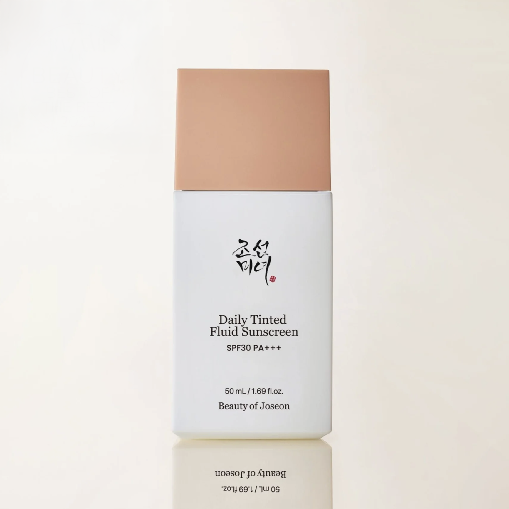 Daily Tinted Fluid Sunscreen bottle with beige cap on a light beige background