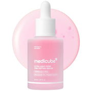 Pink skincare serum bottle with dropper labeled 'medicube' on a white background