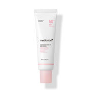Medicube pink tone up sun cream tube on a white background
