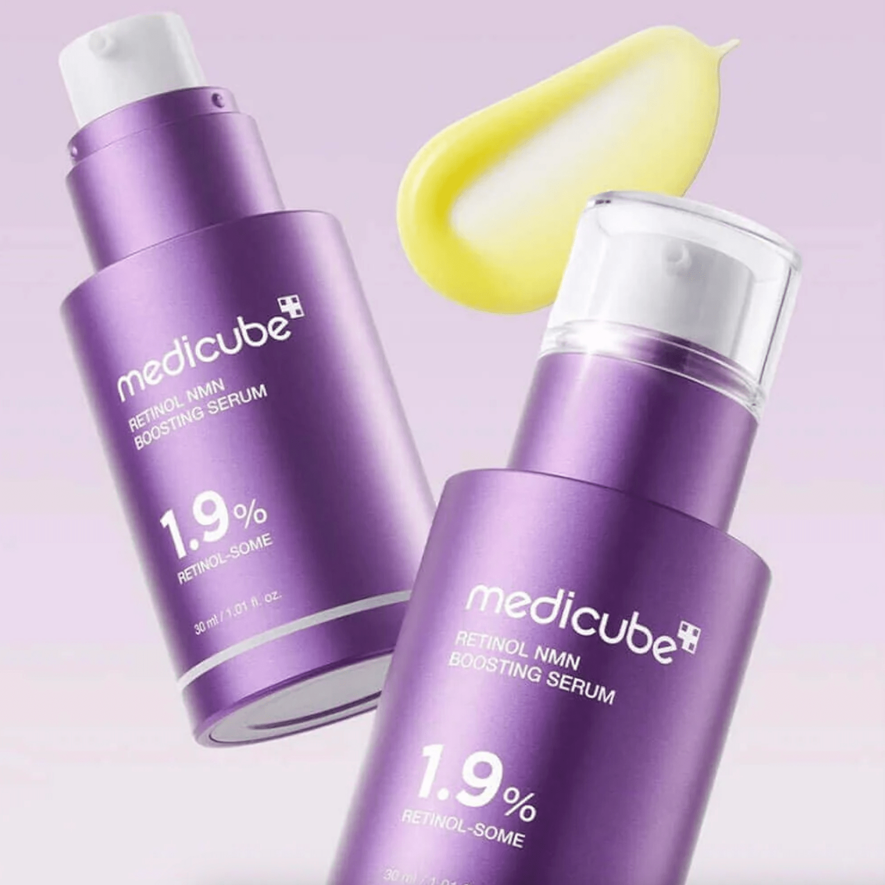 Two MEDICUBE Retinol NMN Boosting Serum bottles on light purple background