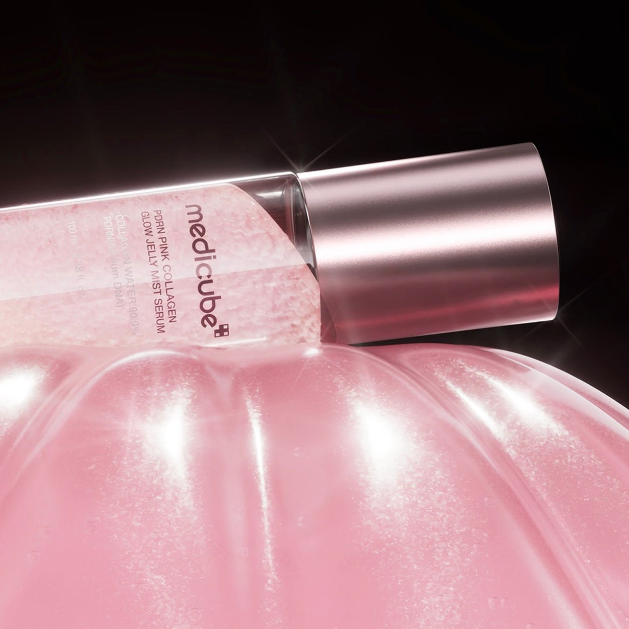 MEDICUBE PDRN Pink Collagen Glow Jelly Mist Serum on a black background