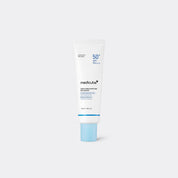 Medicube sunscreen serum bottle on a white background