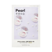 Missha Pearl mask packaging with white pearls on a light purple background