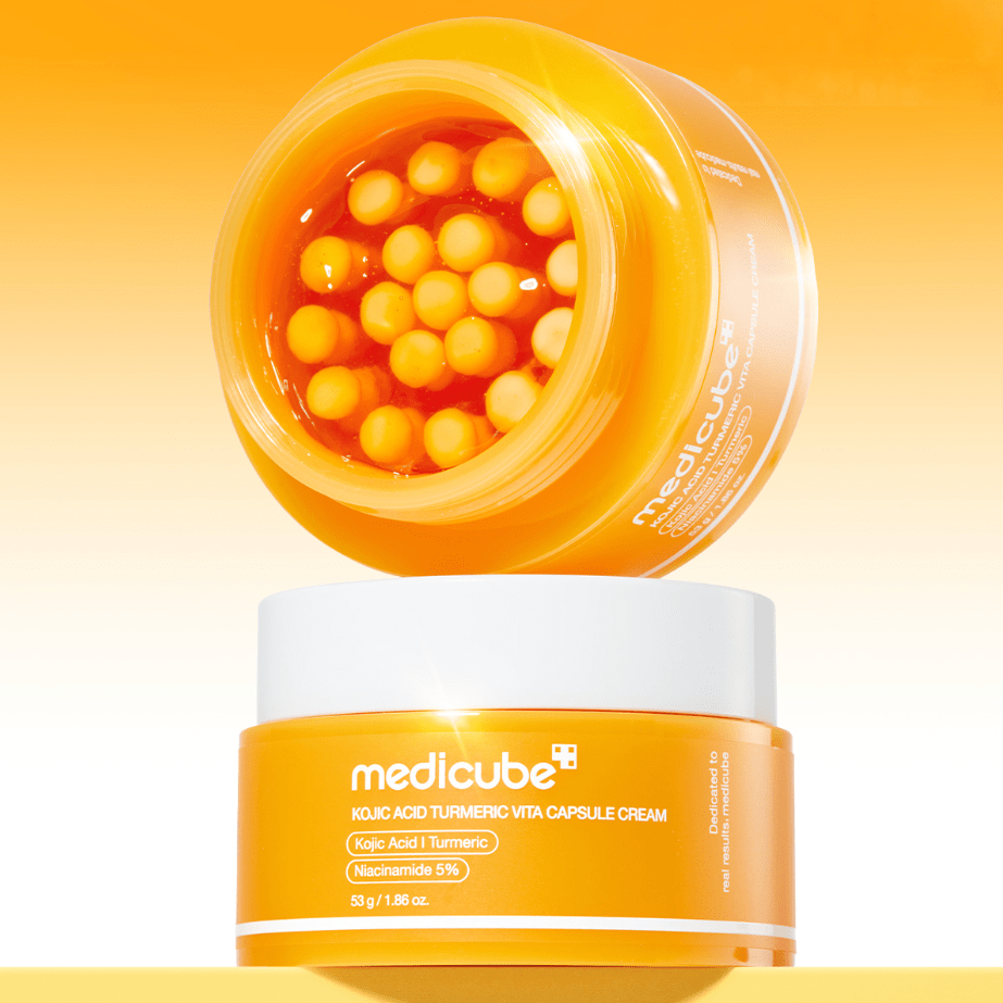 Jar of Medicube KOJIC ACID TURMERIC VITA CAPSULE CREAM  with yellow background