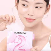 K-beauty model holds NUMBUZIN No.2 Rose PDRN Collagen Plumping Mask