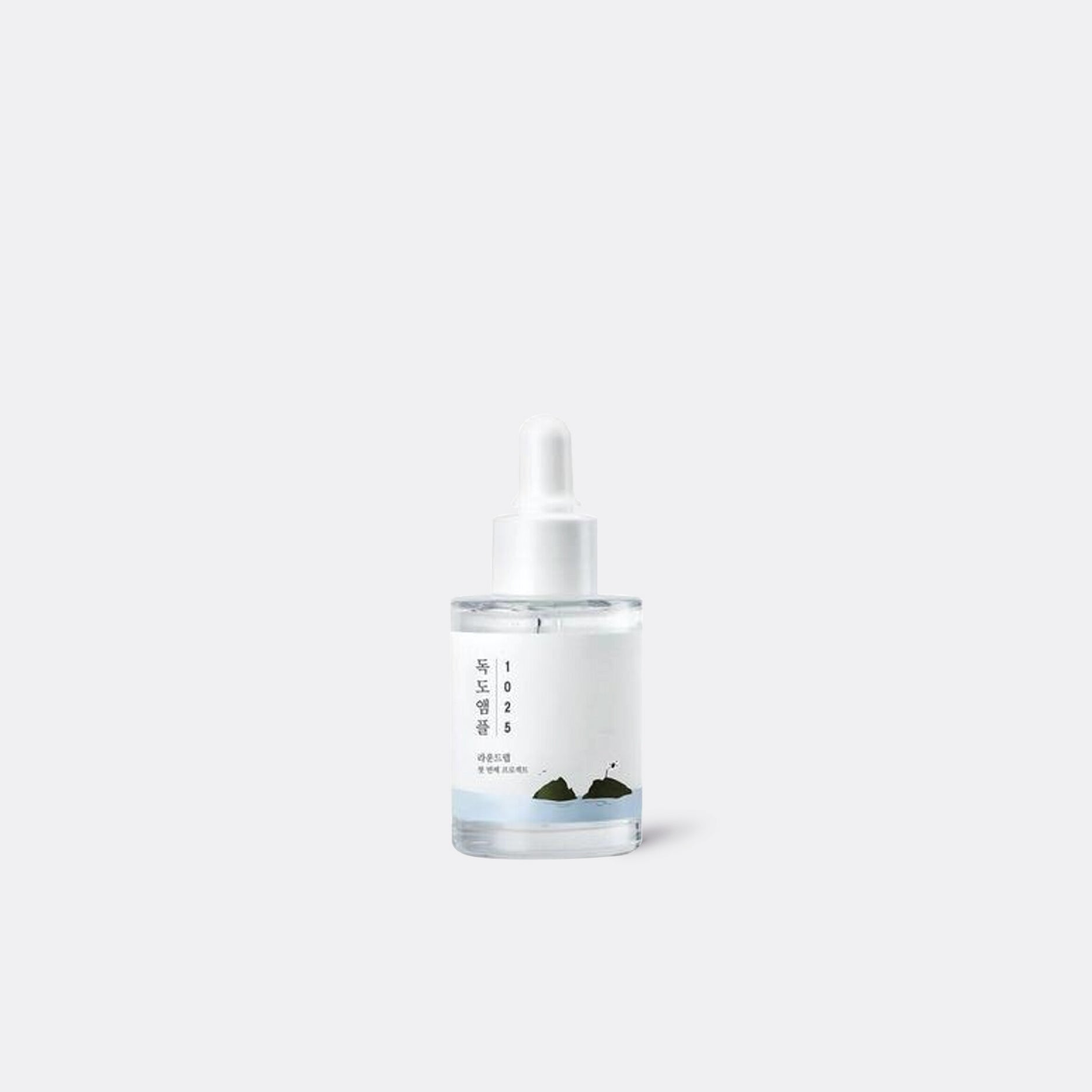 ROUND LAB 1025 Dokdo Ampoule bottle on grey background