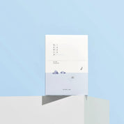 ROUND LAB 1025 Dokdo Water Gel Mask Sheet on the white block with blue background