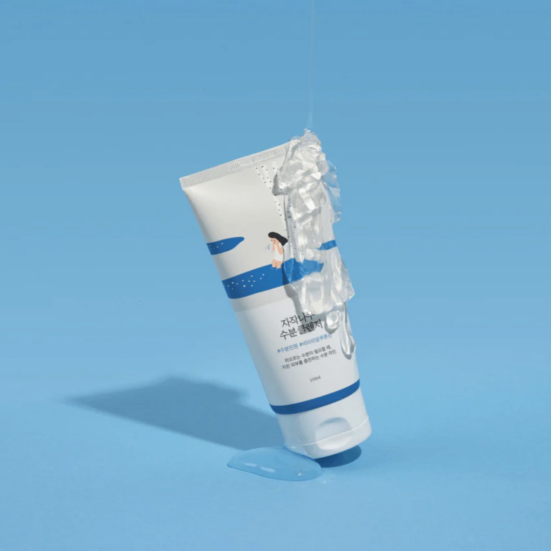 ROUND LAB Birch Juice Moisturizing Cleanser on blue background