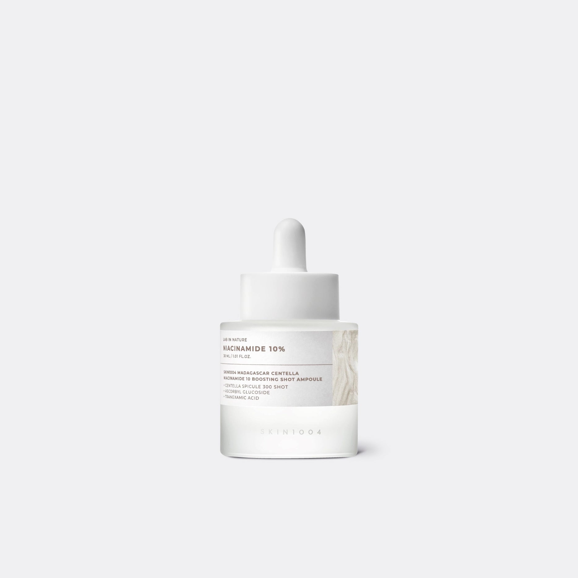 Brightening ampoule: SKIN1004 Niacinamide 10 for reducing dark spots, evening skin tone, and soothing.