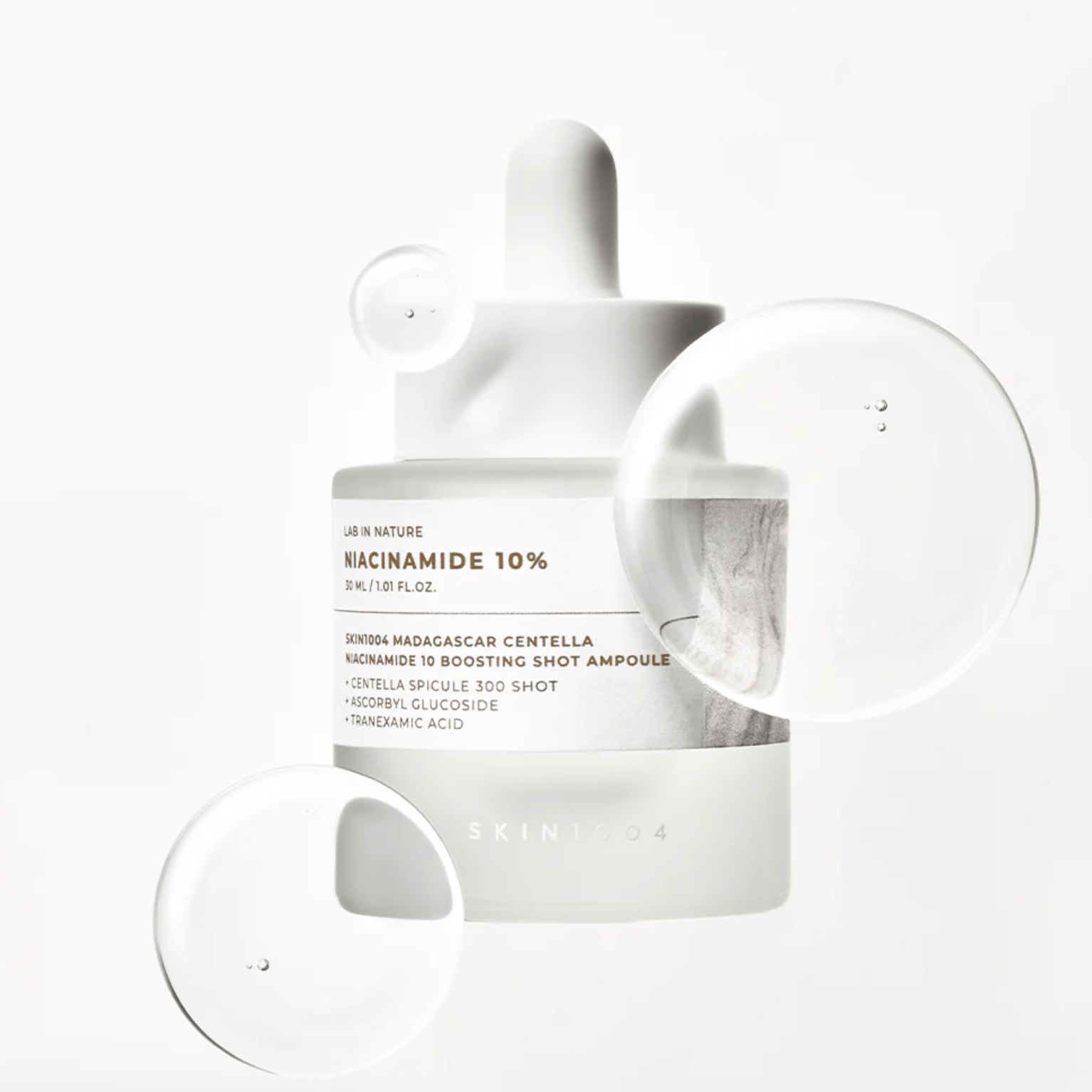 SKIN1004 Centella Niacinamide 10 Boosting Shot Ampoule, featuring Niacinamide and Madagascar Centella.