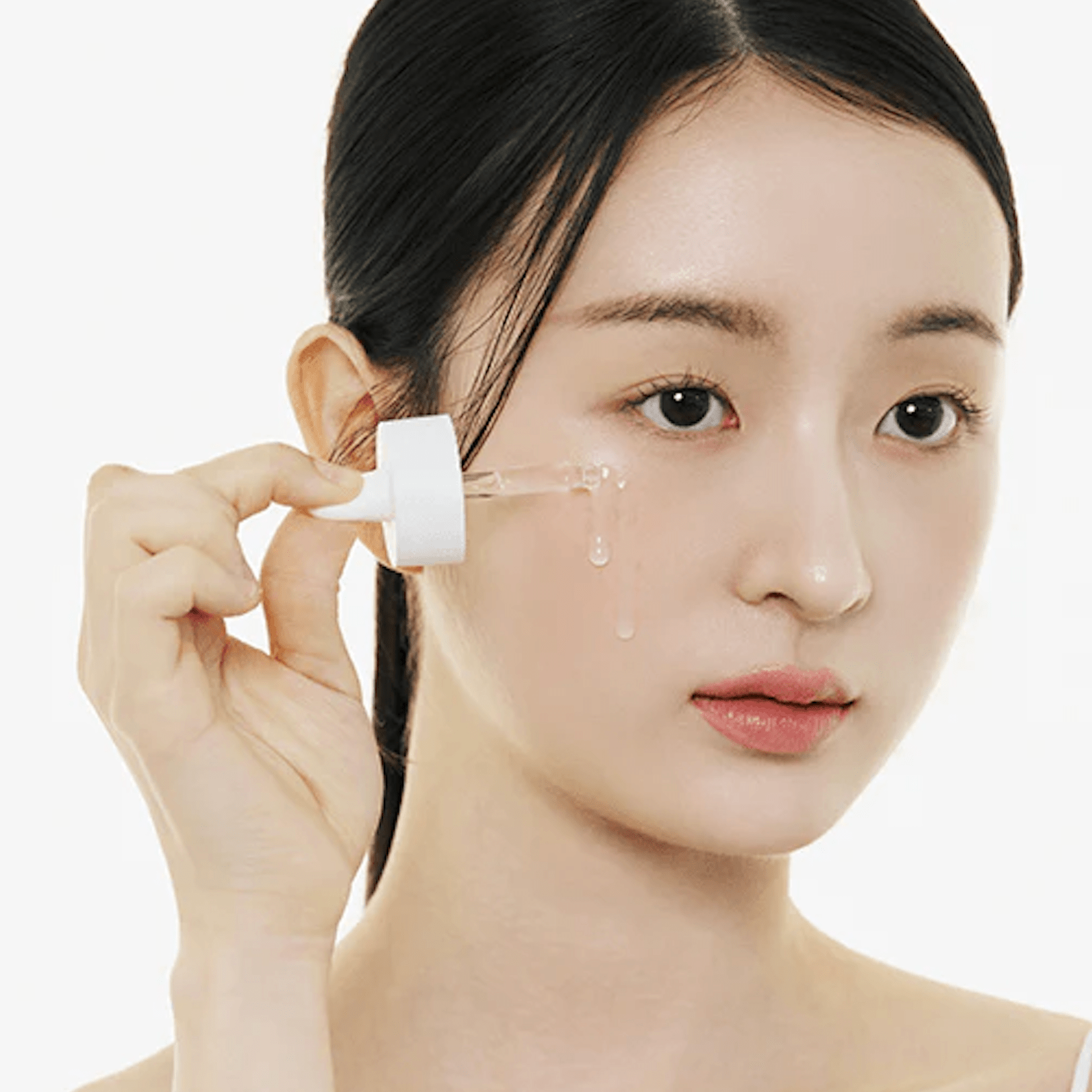 Brightening ampoule: SKIN1004 Niacinamide 10 for reducing dark spots, evening skin tone, and soothing.