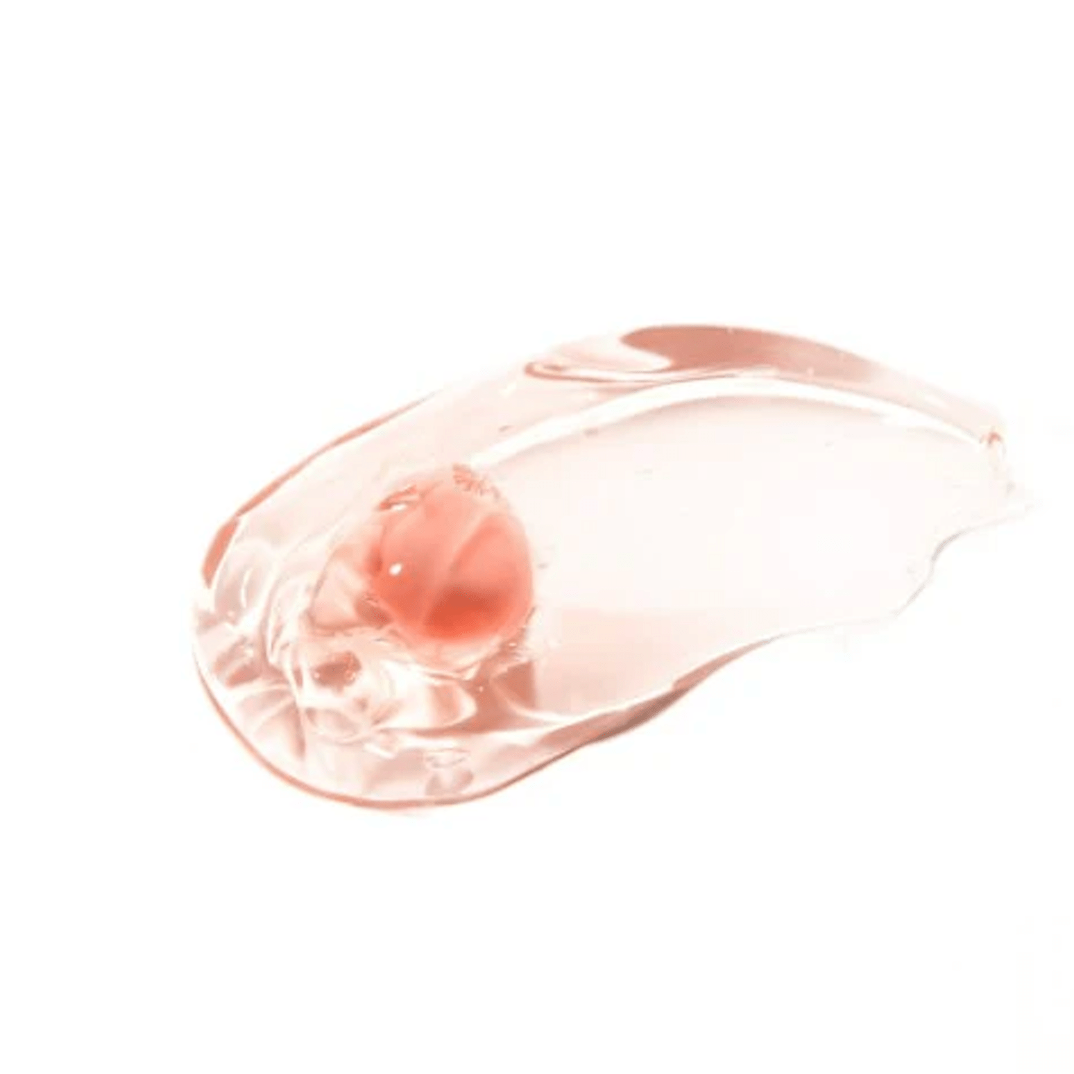 Clear gel-like substance with a pinkish hue on a white background