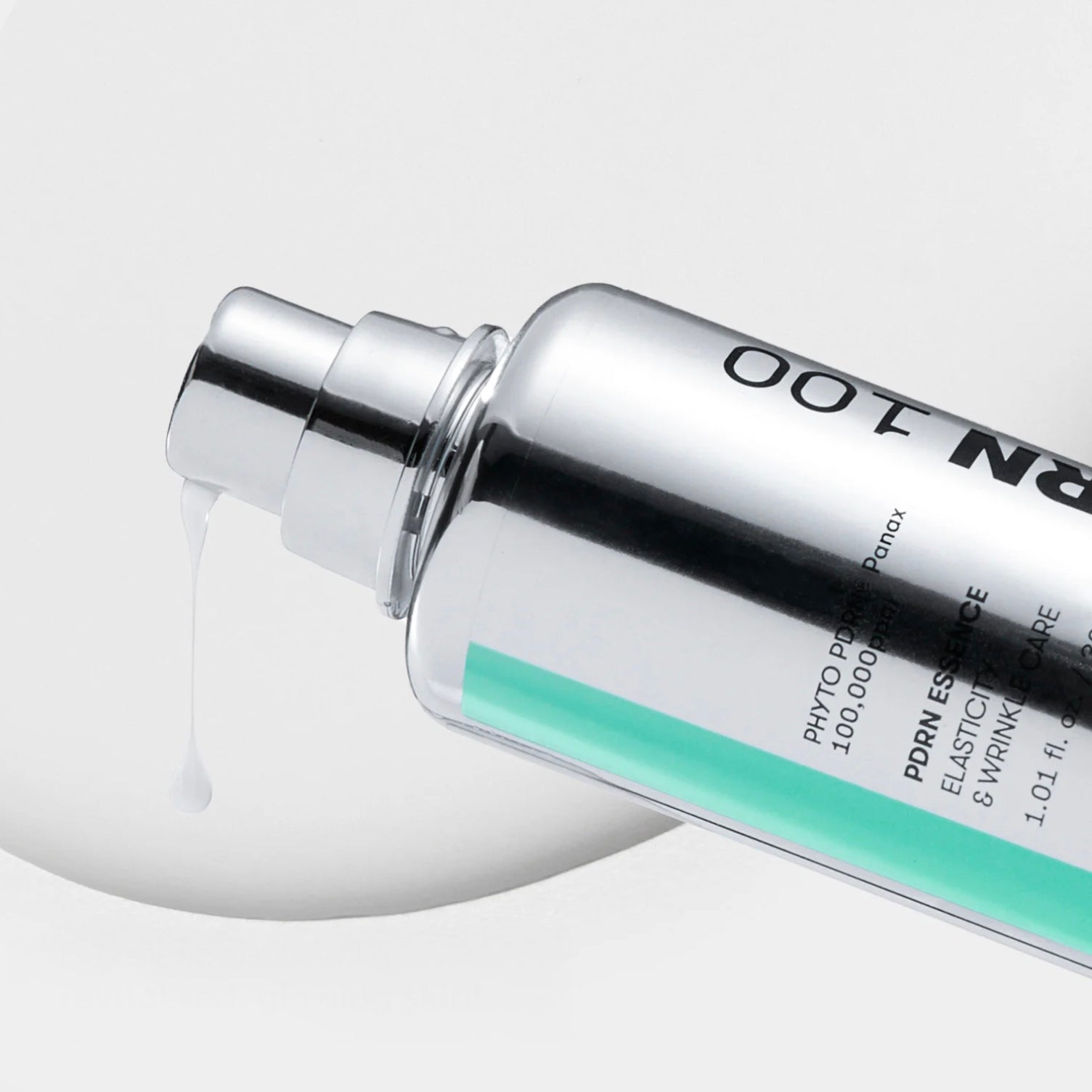 VT COSMETICS PDRN Essence 100  serum bottle with visible branding on a light gray background