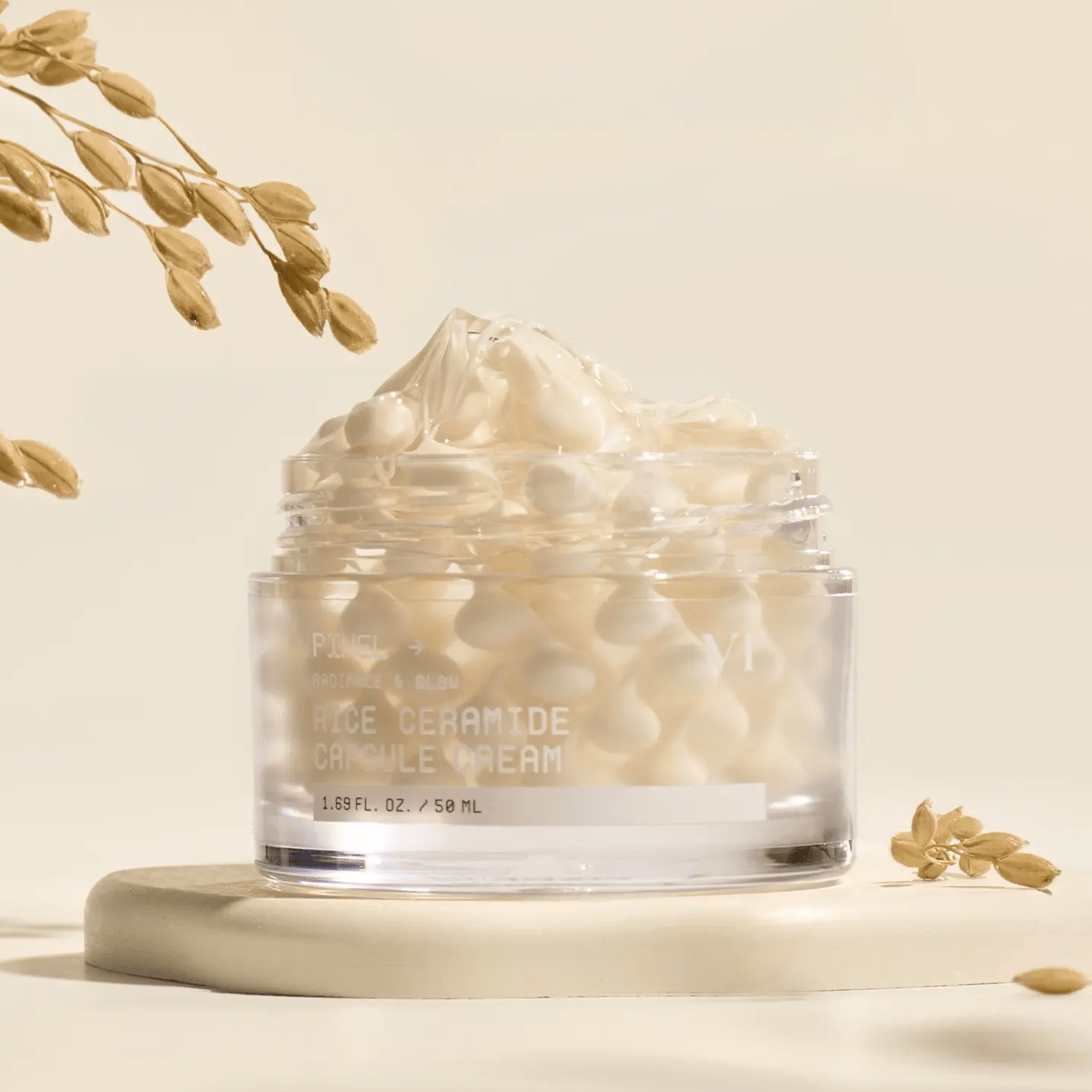 VT COSMETICS Rice Ceramide Capsule Cream with decorative elements on a beige background