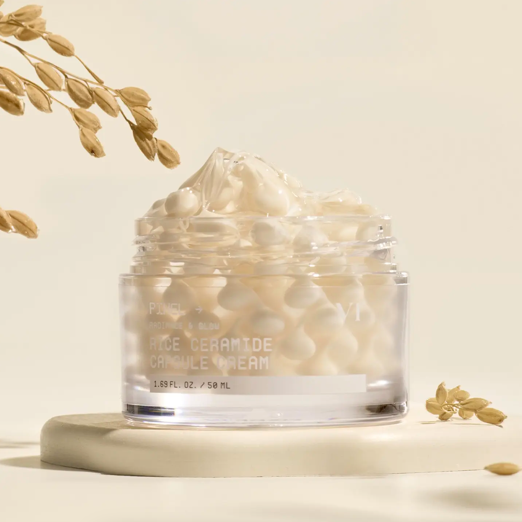 VT COSMETICS Rice Ceramide Capsule Cream with decorative elements on a beige background